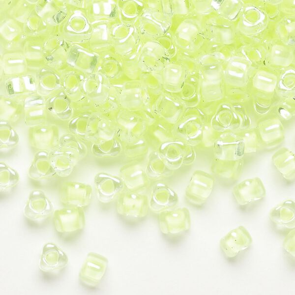 Seed bead, Miyuki, glass, transparent clear color-lined lime, (TR1119), #5 triangle. Sold per 250-gram pkg. image number 0