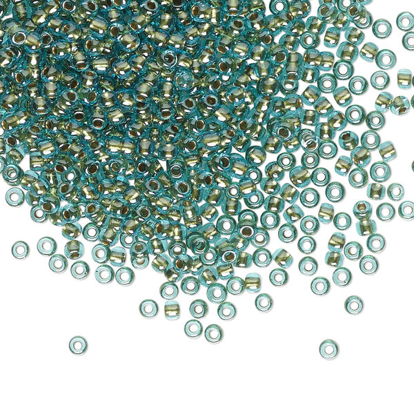 Seed bead, TOHO BEADS®, glass, pkg/250g, #11 round, transparent gold-lined aqua (TR-11-284). image number 0